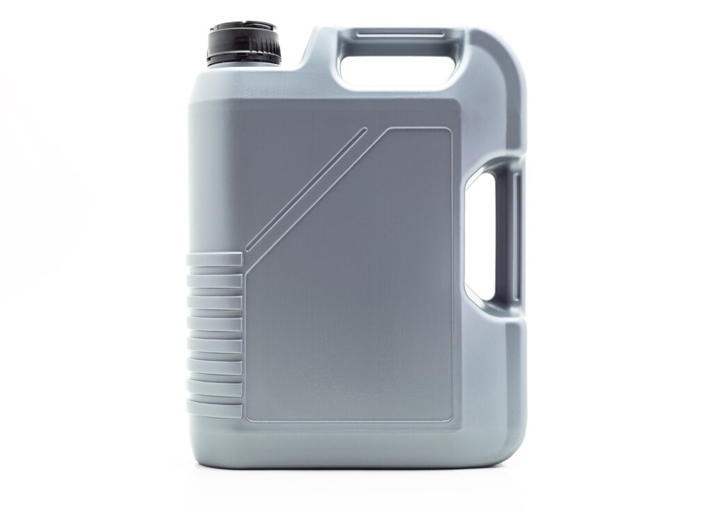 Grey, plastic motor oil container with a capacity of five liters